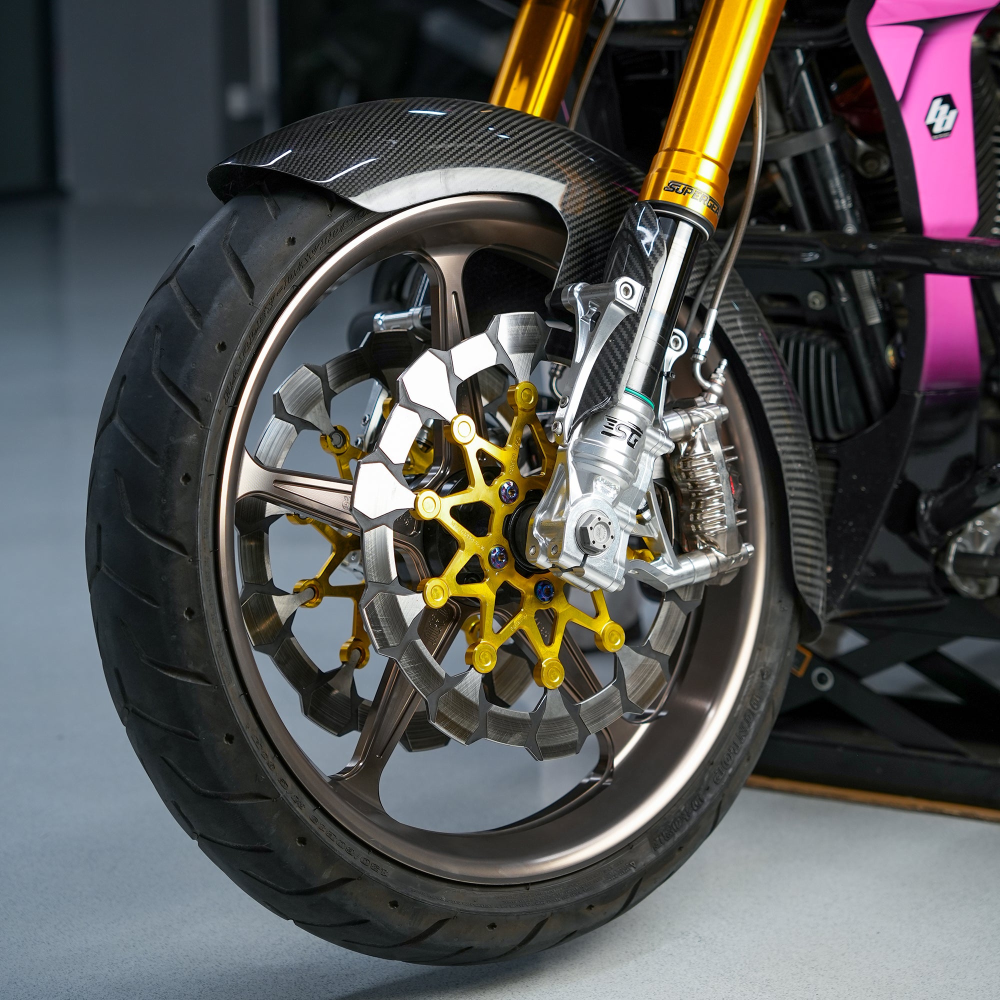 SuperGear Performance Titanium Gold 19" forged front wheel installed on a Harley-Davidson Touring bike