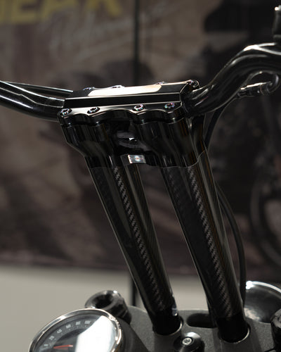 Side view of a 2024 Harley-Davidson CVO Road Glide ST performance bagger equipped with an RF7 handlebar riser.
